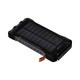 A solar power bank in black with a rugged design, featuring charging indicators and a branding label.