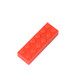 A red stackable brick flash drive featuring a textured surface with raised dots and a logo on the side.
