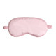 A satin sleep mask in soft pink, featuring an elastic strap for a secure fit. It has a smooth, soft surface.