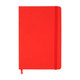 A red notebook with an elastic band closure and a ribbon marker. It features a solid cover and has no visible branding.