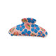 A hair clip in pink with blue flowers and leaves, featuring a curved design and detailed grip edges.
