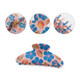 A hair clip featuring a pink background with blue flowers and a glossy finish, showcasing various angles.