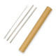 A drink bottle with two stainless steel straws, a cleaning brush, and a cylindrical cardboard container.