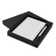 A black gift box containing a white notebook and a silver pen. The set is elegantly presented for gifting.