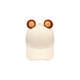 A cream-coloured baseball hat featuring cute brown animal ears on top. It has a logo on the side.