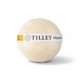 A bath bomb in a round shape, cream-coloured with a yellow label featuring branding.