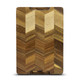 A wooden chopping board featuring a chevron pattern in various shades of brown. It has a logo on the surface.