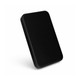A sleek black power bank with a smooth surface, featuring a minimalist design and a subtle logo.