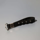 A black key chain stress reliever with popper buttons and a silver attachment ring.