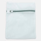 A white mesh laundry bag with a zip closure and a simple design, featuring a logo on the front.