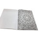 A5 colouring book featuring intricate black and white patterns on one page, with a blank page opposite.