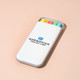 A highlighter set in a white case featuring yellow, orange, pink, and green highlighters, with a logo on the case.