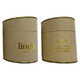 A large candle in a round, kraft paper container with gold accents and text, featuring a linen scent.