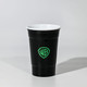 A drink cup featuring a black exterior and a white interior, with a logo on the side.