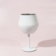 A detachable wine glass in white, featuring a sleek design with a sturdy stem and a circular base.