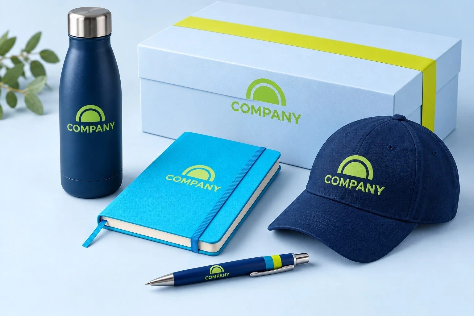 Corporate merchandise concept featuring a bottle, notebook, cap, pen and gift box.