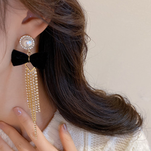 pearl bow earrings