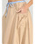 Trick Puff Parachute Skirt, featuring a balloon hem, drawstring waist, and lightweight neutral cotton
