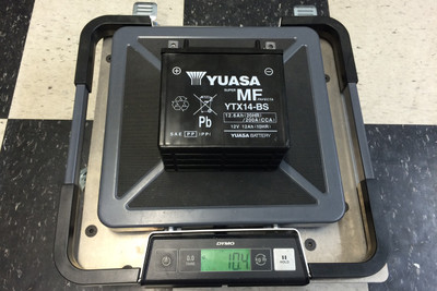 The stock Super Duke battery is 10.4 lbs! Ahhhhhh!