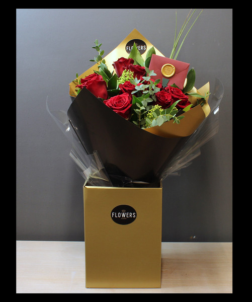 12 Red Roses with greenery