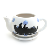 Alice in Wonderland teapot shaped planter
