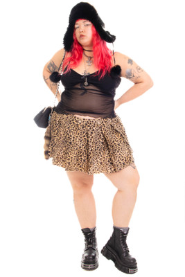 Peekaboo Fuzzy Leopard Print Grommet Mini Skirt