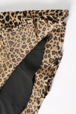 Peekaboo Fuzzy Leopard Print Grommet Mini Skirt