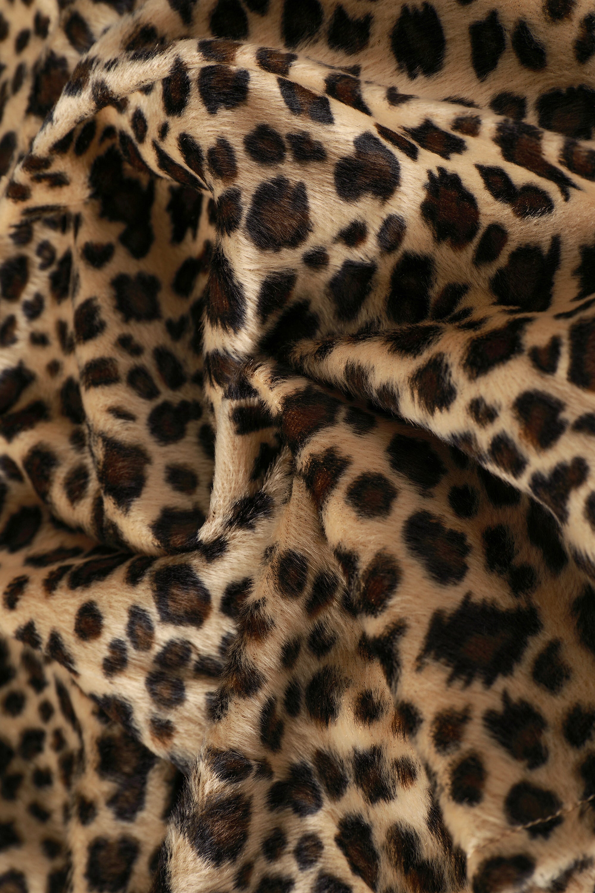 Peekaboo Fuzzy Leopard Print Grommet Mini Skirt