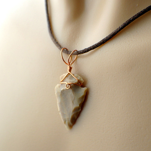 Arrowhead pendant beige wire wrapped in copper