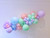 Pastel balloon garland display arch installation for birthday parties and baby showers