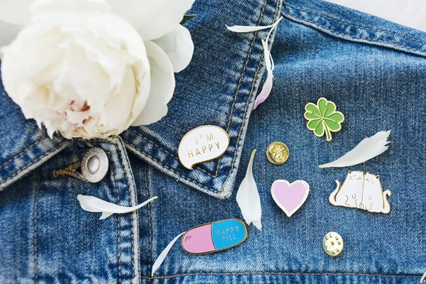 How to Style Custom Pins With Jackets and Everyday Outfits