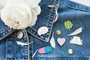 How to Style Custom Pins With Jackets and Everyday Outfits