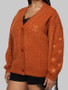 Taylor Swift The Life Of A Showgirl Orange Knitted Cardigan