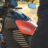 Vermilion seat for S2 Mulholland on black bike detail