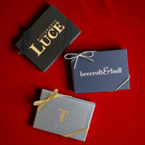 Custom hot-stamped gift card boxes with stretch loops