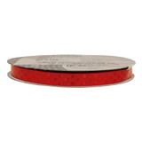 A roll of 3/8" x 25 yds Red MB Dots Ribbon
