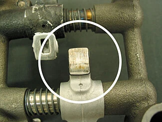 Abnormal wear pattern on 22R/RE rocker arm wear pad
