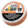 Close-up image of an open Juice Head Nicotine Pouch pack showing the individual pouches neatly arranged inside. The focus is on the texture and size of the pouches, emphasizing their discreet and spit-free design, with a subtle mint leaf in the background to suggest the fresh flavor infusion.