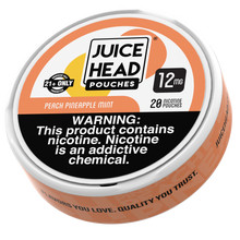 Close-up image of an open Juice Head Nicotine Pouch pack showing the individual pouches neatly arranged inside. The focus is on the texture and size of the pouches, emphasizing their discreet and spit-free design, with a subtle mint leaf in the background to suggest the fresh flavor infusion.