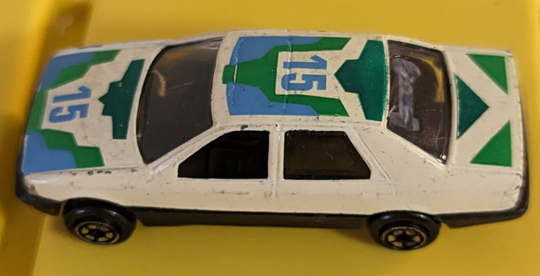 Vintage Yat Ming No. 815 Ford Sierra Beige Blue Green Graphics 1:64 Scale