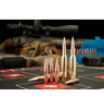 Display of Hornady 30 Cal .308 230 grain A-Tip Match bullets, product number 3091, alongside various ammunition types on a shooting mat. A precision rifle with a scope can be seen in the background, emphasizing the professional and competitive setting. These copper-colored bullets with silver tips are highlighted for their high accuracy and stability, designed for rifles with a 1-9" twist rate.