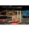 Display of Hornady 30 Cal .308 250 grain A-Tip Match bullets, product number 3092, alongside various ammunition types on a shooting mat. A precision rifle with a scope can be seen in the background, emphasizing the professional and competitive setting. These copper-colored bullets with silver tips are highlighted for their high accuracy and stability, designed for rifles with a 1-8.5" twist rate.