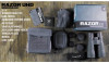 The image displays the Vortex Optics RAZOR UHD 18x56 binoculars and the items included with them. The set appears to include:

The RAZOR UHD Binoculars themselves
Tethered objective lens covers to protect the lenses
A rainguard eyepiece cover for use in inclement weather
A neck strap for carrying
A binocular harness for stability and ease of use during active movement
An accessory/ammo pouch for additional storage
A binocular case for protection and transport
The product manual for instructions and information
A lens cloth for cleaning the optics without scratching them
This setup indicates that the binoculars are well-suited for outdoor activities where high-quality, durable, and reliable optics are required, such as wildlife observation or hunting. The additional accessories are designed to enhance the user experience by providing protection and convenience.