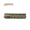 The image depicts a Geissele Automatics 9.3" Super Modular Rail MK8 with M-LOK system in Desert Dirt Color (DDC). This is a type of handguard used on modern modular rifles like the AR-15 platform. The handguard features the M-LOK system, which is a standardized system developed by Magpul that allows for direct attachment of accessories without the need for additional rails. This makes for a lighter, more customizable, and less bulky front end on a rifle. The desert dirt color is a tan or earth color that offers a camouflaged appearance suitable for a desert environment. This handguard is prized for its strong yet lightweight design and its utility in mounting various accessories for tactical or competitive use.