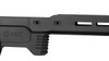 The image provides a close-up of part of the MDT ACC Elite Chassis System, tailored for the Remington 700 platform. Visible is the chassis' forend, which typically features M-LOK slots for the attachment of various accessories, such as bipods, rails, or hand stops. The forend is designed to offer a rigid support for the rifle barrel, improving accuracy by minimizing flex. The detail here shows the MDT logo, signifying brand quality, and the texturing near the end of the forend for enhanced grip. This chassis system is known for its customization options, allowing shooters to tailor their setup to their specific needs for competitive shooting or precision applications.