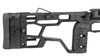 This image features a segment of the MDT (Modular Driven Technologies) ACC (Adjustable Core Competition) Elite Chassis System, specifically designed for the Remington 700 rifle platform. Visible in the image is the buttstock portion of the chassis, which is known for its adjustability. This includes the cheek riser, length of pull, and butt-pad height, all of which can typically be tailored to the shooter's preferences for ergonomics and comfort. The skeletonized design helps to reduce weight while maintaining structural integrity. The MDT chassis systems are favored in the precision shooting community for their modularity and ability to customize the rifle to the shooter's needs for competitive shooting, hunting, or tactical applications.