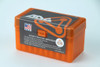 Orange ADG Brass ammunition box for 338 Edge cartridges, featuring the company's logo and detailed product information on a black label. The label highlights cartridge specifications and includes a graphic of a bullet, making it suitable for display in retail settings. This sturdy box, designed for safe storage and transport, accommodates 50 cartridges, catering to shooting enthusiasts and collectors.