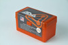 ADG Brass orange ammunition box for 338 Lapua Magnum cartridges, displaying a bold logo and American flag on the label along with detailed product specifications. This sturdy plastic box is designed for secure cartridge storage and transportation, holding up to 50 pieces. Perfect for retailers and ammunition collectors.