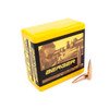Bright yellow box of Berger Hybrid Target bullets, product number 26414, for 6.5mm rifles, weighing 140gr. The packaging, which contains 100 bullets, features a clear image on its side of a shooter aiming at a target. Two copper-colored bullets are displayed in front of the box, highlighting the product's design and precision engineering for competitive shooting.
