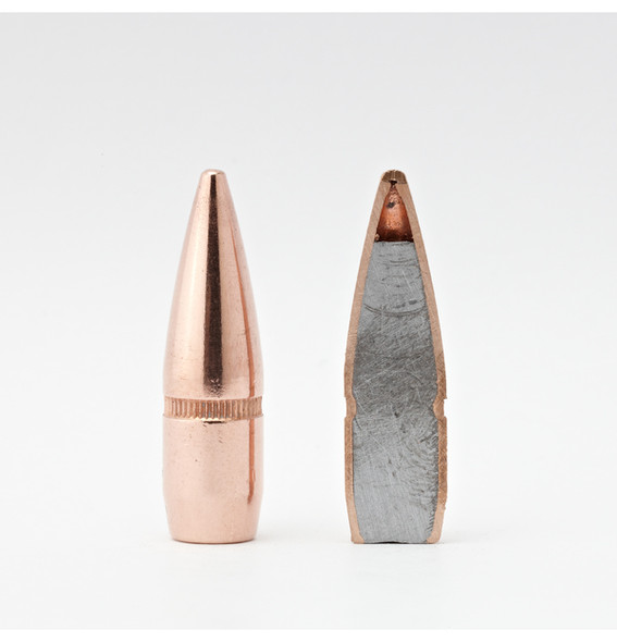 Image of two Hornady 30 Caliber .308 Diameter 168 Grain BTHP (Boat Tail Hollow Point) Match bullets, model number 30501. One bullet is shown intact with its polished copper jacket, and the other is bisected, revealing its lead core and the internal structure designed for precision and stability in flight. Displayed against a clean, white background, these bullets exemplify the high-quality manufacturing and design intended for match-grade shooting accuracy.